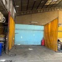 کارگر کارواش جای خواب دارد