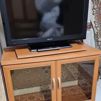 تلوزیون سونی براویا ۳۲اینچ به همراه میز تی وی|تلویزیون و پروژکتور|تهران, ظهیرآباد|دیوار