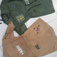 لباس بچه گونه|کفش و لباس بچه|قم, قلعه کامکار|دیوار