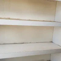 یک عدد قفسه ای مغازه
