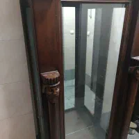 بوفه چوبی بدون زدگی همراه آینه و قفسه شیشه ای|بوفه، ویترین، کنسول|کرج, اصفهانی‌ها|دیوار