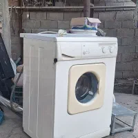 لباس شویی اوتمات