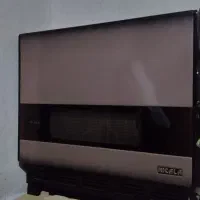 بخاری نیک کالا ، کفی تخت فلزی و سنگ روی کابینت