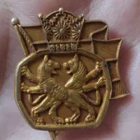 سنجاق سینه شیرخورشید