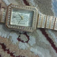 ساعت زیبای طلایی زنانه|ساعت|گرمی, |دیوار