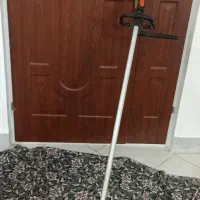 دسته علف زن پشتی