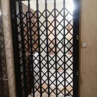 درب پنچره آکاردئونی الوحفاظ رحمتی در زنجان