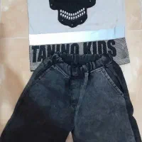 تعداد زیادی لباس پسرانه