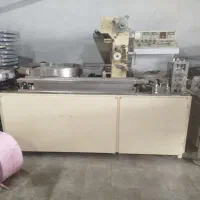 دستگاه بسته بندی رولند