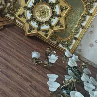 گل سقفی دور لوستر