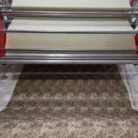 کارگر آشنا به کلندر پارچه