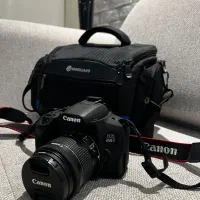 دوربین کنون Canon EOS 850D + لنز 18-55mm  مثل نو