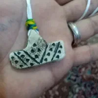 عطف کیفی کهنه و یک جفت مهره عطف