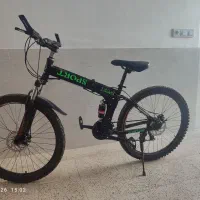 دوچرخه مارک مرسدس بنز با مشتری واقعی کنار میام