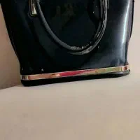 کیف|کیف، کفش، کمربند|بندر گناوه, |دیوار