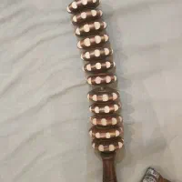 ماساژور چوبی دستی