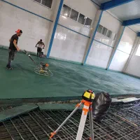 بتن ریزی کف با ماله پروانه همراه لیزر