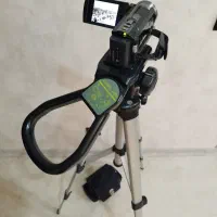 دوربین فیلمبرداری عکاسی سونی اصل با سه پایه و کیف|دوربین عکاسی و فیلم‌برداری|کرمان, |دیوار