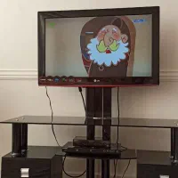 تلویزیون ۳۲ اینچ LG LCD و میز ترک به مارک آرچلیک|تلویزیون و پروژکتور|میاندوآب, |دیوار