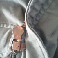 اور کت آمریکایی|لباس|مشهد, شهید احمدی روشن|دیوار