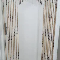 پرده آویز چوبی