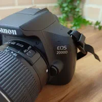 دوربین کنون 2000d همراه با لنز 18-55|دوربین عکاسی و فیلم‌برداری|کرج, شهرک جهان‌نما|دیوار