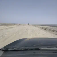 راننده لودر و بیل مکانیکی چرخ زنجیری