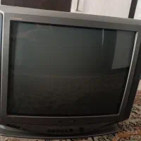 تلویزیون ۲۱ اینچ همراه با میز