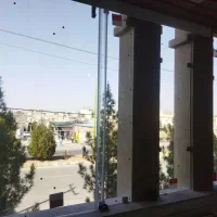 نصب وتعمیرشیشه سکوریت و سکوریت استوک شیشه ساختمانی