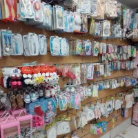 سیسمونی نوزاد ولباس کودک ونوجوان.برازجان.لباس بچه