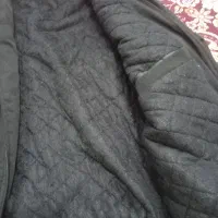 کاپشن|لباس|گوگان, |دیوار