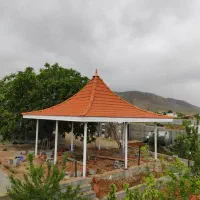 اجرای آلاچیق سقف سفال  سقف شیب دار  دامپا درب برقی