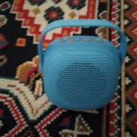 اسپیکر فلش خور وبلوتزی با گوشی موبایل