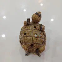 مجسمه و جا شمعی
