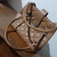 کیف|کیف، کفش، کمربند|نهاوند, |دیوار
