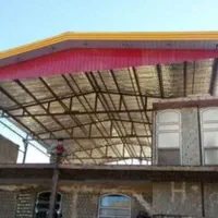 اجرای شیروانی خرپانمالمبه آلاچیق سردرب