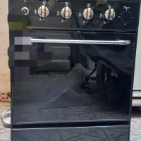 اجاق گاز ۴ شعله صفحه لعابی مشکی طرح فر