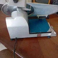 کالباس بر محک ترازو دار