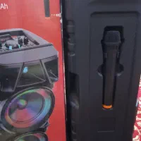 اسپیکر بزرگ چرخ دار همراه با میکروفن و کنترل|پخش‌کننده همراه|رامشیر, |دیوار