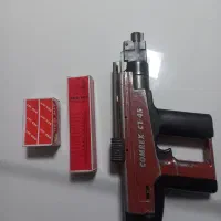 تفنگ هلتی و میخ و چاشنی