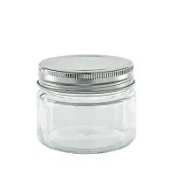 جار شیشه ای استوانه ای کوچک در کانتینری