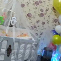گهواره کنار تخت مادر، متحرک
