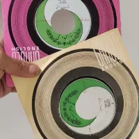 الات موسیقی قدیمی صفحه گرام با آرم شیروخورشید