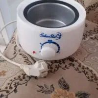 دستگاه موم گرم کن