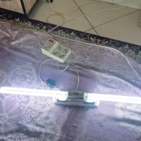 یک عدد مهتابی دیواری