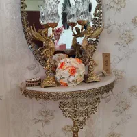 آیینه و شمعدان و کنسول
