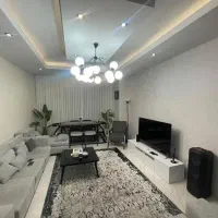 ۶۵ متر  رو به نما دو نبش / رو به روی باغ سیب