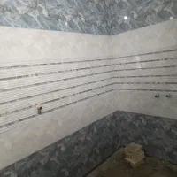 انواع کارهای کاشی،سرامیک و سنگ وسیمان کاری..