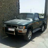 تویوتا هایلوکس تک کابین شاسی بلند کمک دار