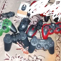 چند عدد موس و دسته کامپیوتر